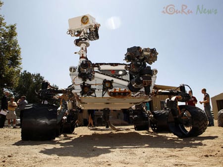 An engineering model of NASA's Curiosity Mars rover is seen in a sandy, Mars-like environment named the Mars Yard at NASA's Jet Propulsion Laboratory in Pasadena, California