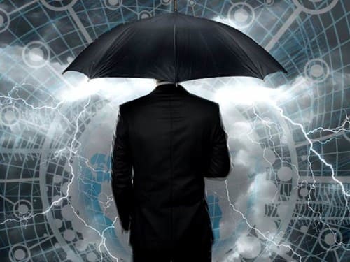smb-security-businessman-wtih-umbrella-storm_contentfullwidth
